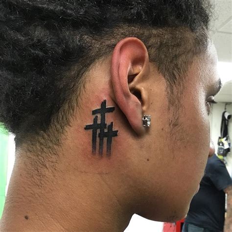 cross on the neck tattoo|gorilla with jesus cross tattoo.